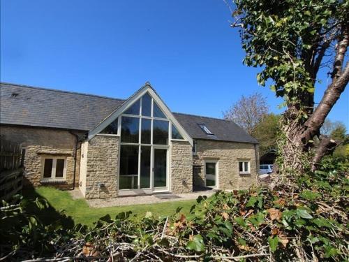 Malt Barn Holiday Home with 7 Bedrooms Hot… gîte à louer Asthall