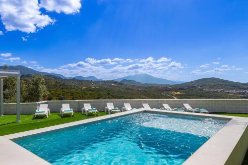 Peldbaseins, Retiro campestre - Piscina privada - Vistas - BBQ - 12 invitados - 4 dorm - Parking gratis in Riogordo