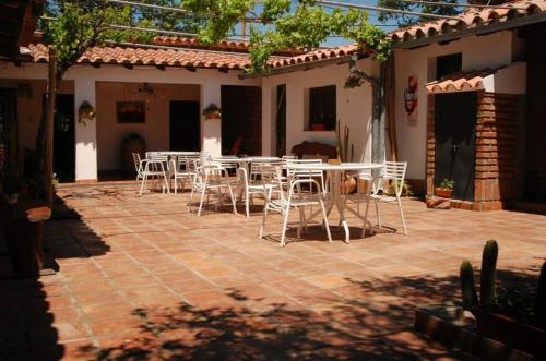 Hostal Tierra de Vinos Hostal Tierra de Vinos is perfectly located for both business and leisure guests in Cafayate-Tolombon. The property has everything you need for a comfortable stay. Service-minded staff will welcome an