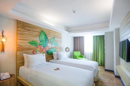 MaxOneHotels at Ubud Ideally located in the Ubud area, MaxOneHotels at Ubud promises a relaxing and wonderful visit. The property has everything you need for a comfortable stay. Service-minded staff will welcome and guide