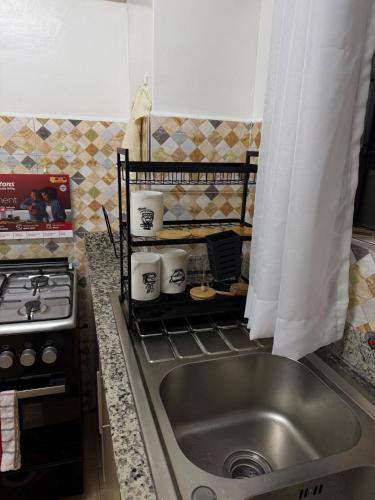Spacious 2BR Near Two Rivers Mall in รูอากา