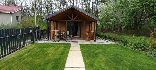 Cozy wooden cabin near Kyiv with a terrace