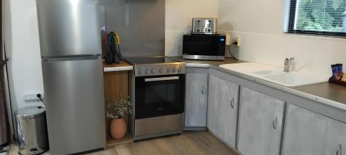 Kitchen, TePopo Gardens Rural Retreat in Stratford