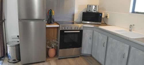 Kitchen, TePopo Gardens Rural Retreat in Stratford