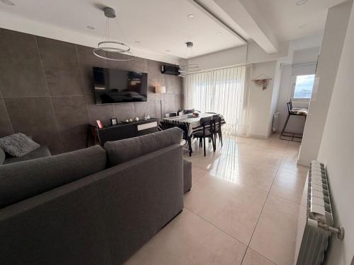 Modern apartment with balconies and open views