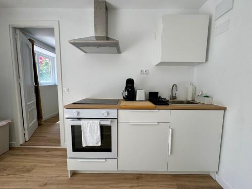 dapur, Modern 2-Bedroom Apt at Villa near the coast in La Sierrezuela