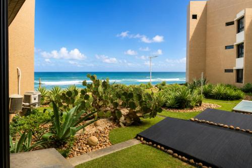 Flat aconchegante beira-mar na Pituba até 4 hóspedes – khách sạn tại Itaigara