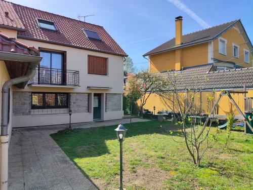 Сад, Maison avec jardin à Sucy, Proche Paris et nature (Maison avec jardin a Sucy, Proche Paris et nature) in Боней-Сюр-Марн
