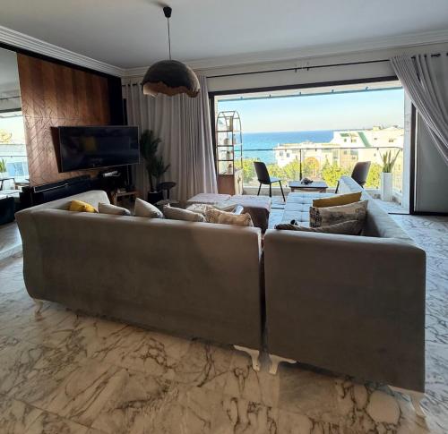 Cozy beachfront apt amazing Grin-Blu view&Barbecue in Gammarth