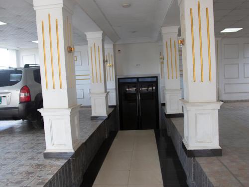 ทางเข้า, Champion Hotel in โบนาเมรี