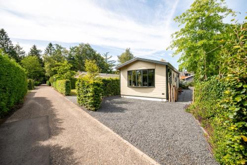Chalet De Eik, sfeervol chalet met tuin, op de Veluwe, Putten