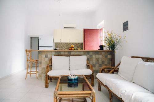 Emporios 1930, Seafront stone house in Emporios