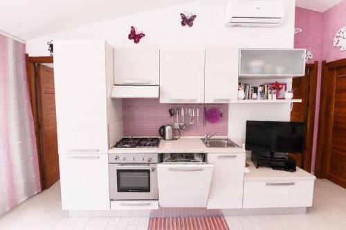 Kitchen, EasyFlatSardinia - Purple House - Pinus Village in Santa Margherita di Pula