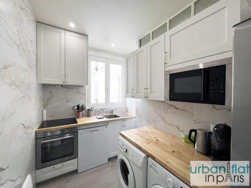 UrbanFlat 180 - Bel Appartement Rue des Rosiers Paris Marais - image 14