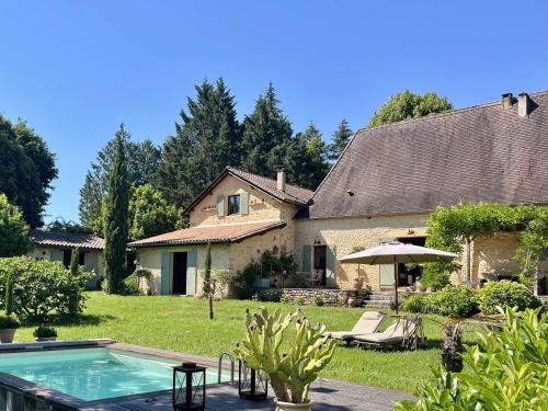 Maison en pierre avec piscine chauffée à Paunat - FR-1-824-10 gîte à louer Paunat
