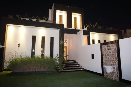 Viesnīcas āriene, غرفة عائلية بالبيت Family Room in House (غرفة عائلية بالبيت Family Room in House) in Al Masnaah