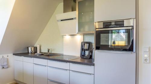 virtuve, Appartment Ahoi in Volervīka