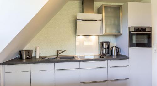 virtuve, Appartment Ahoi in Volervīka