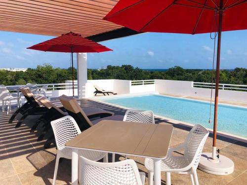 Relaxed Jungle Retreat Near the Beach in אקומל