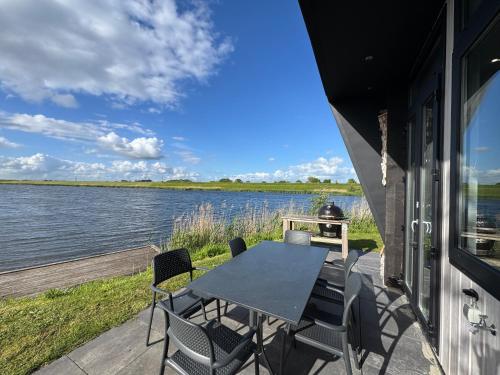 De IJssel Eilanden Chalet Steg SixtySix Kampen mit Zaun Nr 766