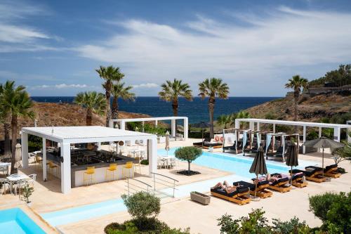 Aurora Luxury Suites - Tap to explore photos