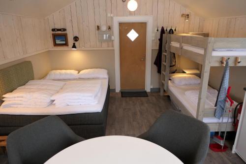 Viesnīcas āriene, Camping cottages in nature Shared toilet and shower in Hommelsto