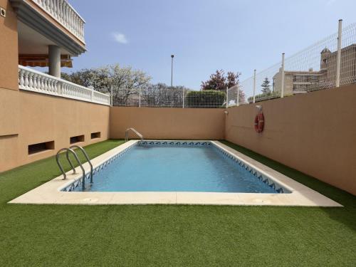 Global Vacacional, planta baja con gran terraza y urbanizacion con piscina in Canet d'En Berenguer