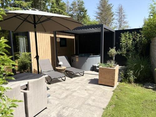  Wellnesslodge Scholekster met jacuzzi en uitzicht in Dalerveen