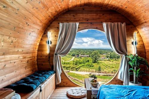 Incredibly Unique Barrel Pod on a Beautiful Private Vineyard with Breathtaking Views for an Unforget in Jonesville (NC)