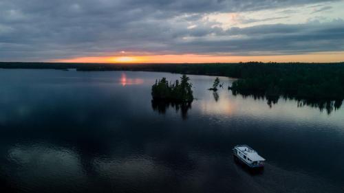 Spacious Getaway Series Houseboat with Water Slide & Penthouse Deck Near Babbitt, Minnesota in Babbitt