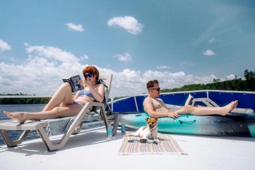 Spacious Getaway Series Houseboat with Water Slide & Penthouse Deck Near Babbitt, Minnesota in Babbitt