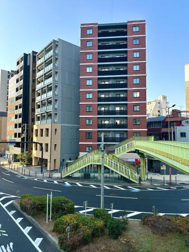 大阪 天神橋筋 新築現代民宿 自助入住 獨立浴室廁所 交通方便 寧靜社區 in North Osaka