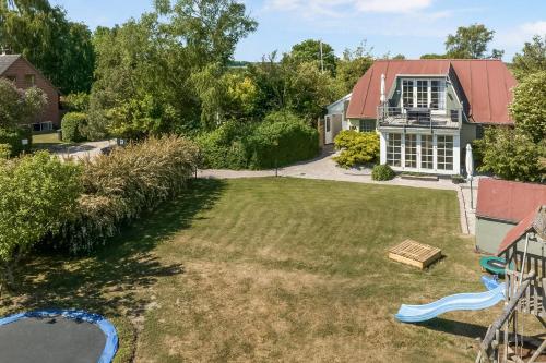 Kinderfreundliches Ferienhaus Mit Großem Pool in Otterup