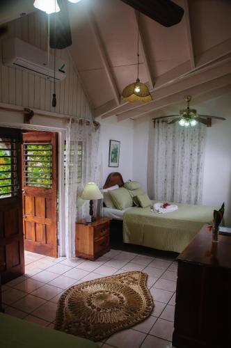 Quartos, Firefly Beach Cottages in Negril