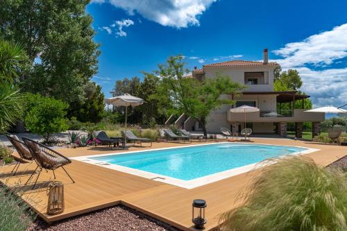 Villa Polyxeni Magnolia 150m from the sea gîte à louer Kastélla