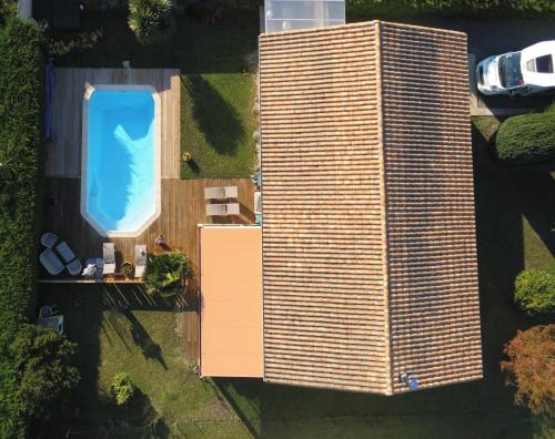 Bassein, Villa au calme entre lac et océan avec piscine privée et spa à Hourtin (Villa au calme entre lac et ocean avec piscine privee et spa a Hourtin) in Hourtin