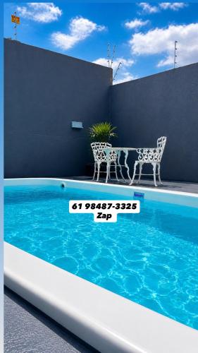 A Casa Piscina Quente Hidro e Cascata E Roupa de Cama Incluso in Portal das Aguas Quentes