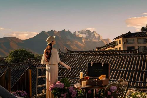 Yunman Sky Cloud Quiet Garden Guesthouse offers breakfast and afternoon tea with free airport shuttle services The hotel provides a platform for visiting the ancient city and Yulong snow, Лицзян