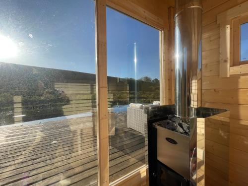Sauna, "The Studio" Contemporary studio with organic swimming pool in Skelsmergh