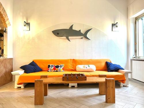 Koplietošanas atpūtas telpa ar TV, Home Berchi Boutique Marina di Chieuti in Chieuti