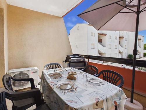 Appartement fonctionnel avec terrasse ensoleillée - FR-1-326-879