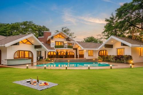 StayVista at Gulmohar Gardens with Gazebo, BBQ