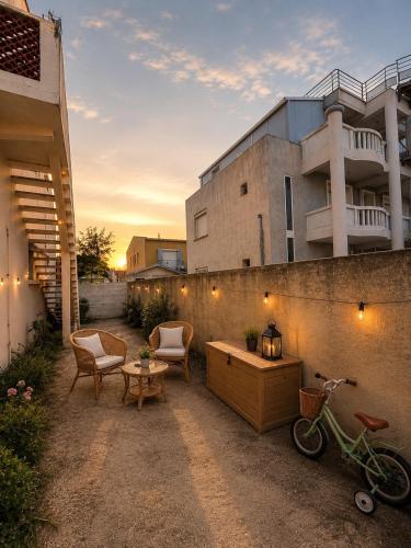 maison avec vue mer, terrasse, parking privé jardin et équipements famille