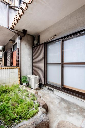花園, 梅蘭の庭 天下茶屋天王寺商圈 地铁直达梅田带小院两层日式一户建 采光通透 步行可达商店街 in 西成區