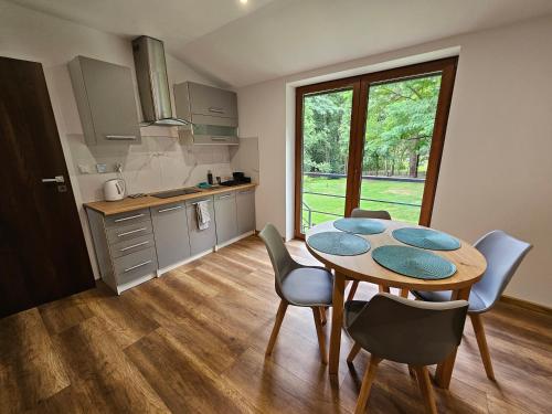 Nad Stawem -apartamenty na wynajem in Zarki Letnisko