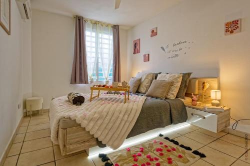 Nid rose paradis secret au robert avec jacuzzi – khách sạn tại La Trinite
