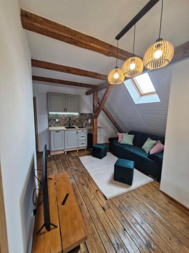 Mazurska Ostoja Wiartel apartament na poddaszu in Wiartel