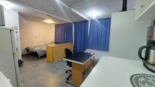 Cozy studio apartment with 2 beds and kitchen in Havange