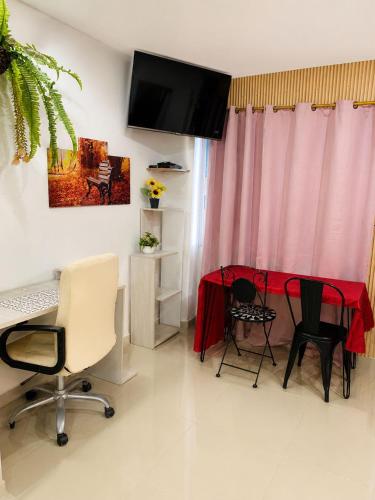 Estancias Aleli 03 comodo apt stdio cerca terminal ent sal aerpto CC Chipichape cc único centro eventos valle del Pacfco OrquideoramasamecobaseAerea acuapqdelacána ccEstacion cocina nevera tvcama Quink un dormitorio - image 4