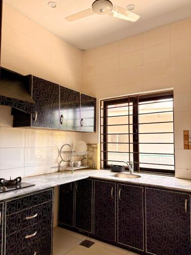 Kitchen, Spacious 2BR Family Retreat Wifi & Private Floor in Bhurban